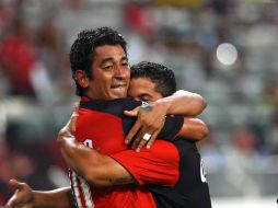 Alfredo Moreno (izq) festaja su gol con otro compañero, es la primera victoria del Atlas en el torneo. E. PACHECO  /