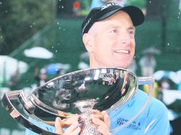 El estadounidense Jim Furyk se adjudicó 10 MDD por terminar primero en los playoffs de la FedEx Cup. AFP  /
