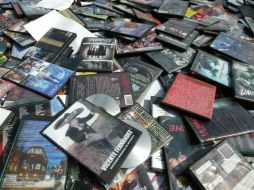 Fueron asegurados cinco mil nueve CD y siete mil 709 DVD. INFORMADOR ARCHIVO  /