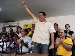 El diputado electo Juan Carlos Caldera, celebra su triunfo. AFP  /