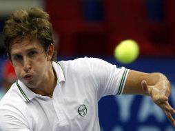 El tenista ruso Igor Andreev durante el torneo de Kuala Lumpur. AP  /