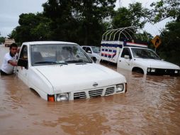 Las fuertes lluvias en el entidad dejaron inundaciones y reblandecimientos en cerros. NTX  /