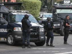 Agentes de la Secretaría de Seguridad Pública resguardan las instalaciones de la SIEDO. ARCHIVO  /