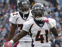 Cassius Vaughn (41) celebra la anotación de su equipo ante Titanes. AP  /
