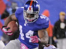 Ahmad Bradshaw (44) consiguió un acarreo de anotación de tres yardas. AP  /