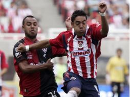 Marco Fabian durante el encuentro ante el Atlas. REUTERS  /