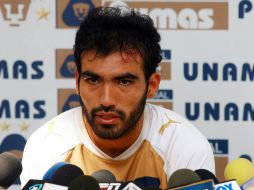 El mediocampista de Pumas Jehu Chiapas haciendo declaraciones en la rueda de prensa. MEXSPORT  /