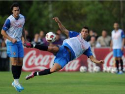 Cristiano Ronaldo práctica con sus compañeros de la Selección de Portugal. AFP  /