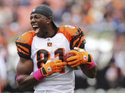 Owens ríe durante el calentamiento previo al juego ante Cleveland. AP  /