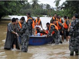 Las peores inundaciones en el sur de China en casi medio siglo obligó a la evacuación de 130 mil habitantes. AP  /