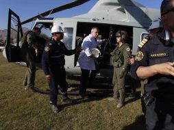 El ministro de Salud, Jaime Mañalich y otros miembros del equipo, realizaron un ensayo del operativo del rescate. AP  /