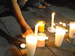 Familiares y amigos dieron hoy el último adiós a la estudiante universitaria Lucila Quintanilla Ocañas. AFP  /
