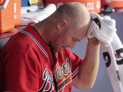 Brooks Conrad lamenta el grave error que tuvo el cual otorgó la victoria a los Gigantes de San Francisco. AP  /