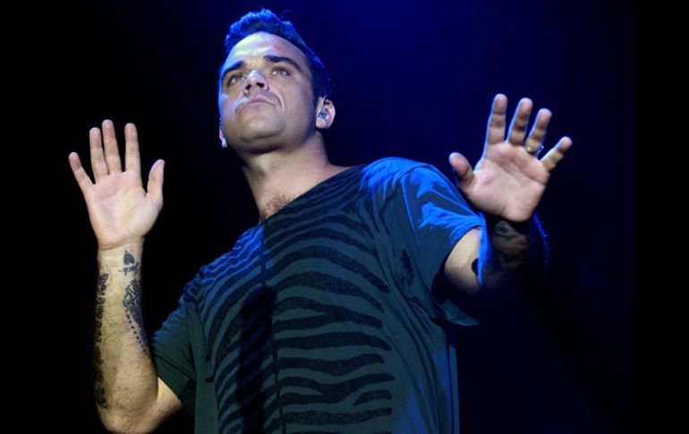 Después de cinco años Williams decidió reunirse con 'Take That'. REUTERS  /