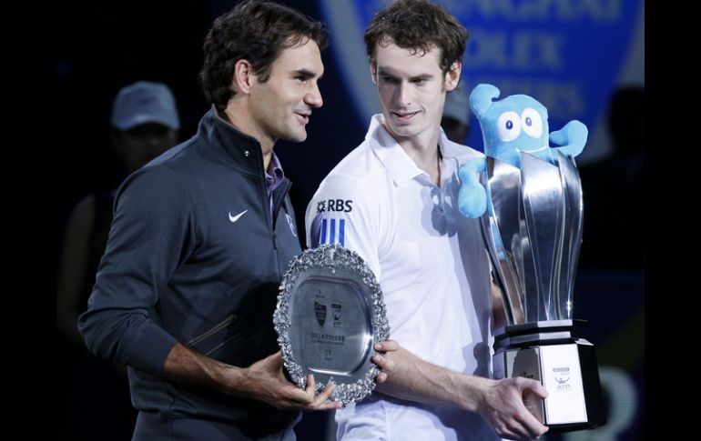 Murray (der.) ya había derrotado al suizo Federer (izq.) en el Másters 1.000 de Toronto. AP  /