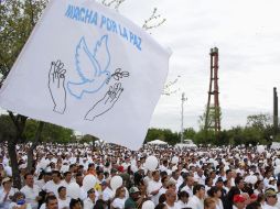 En marzo pasado, personas marcharon también para pedir por la paz en Nuevo León. EFE  /