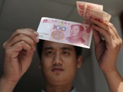 La polítca devaluatoria del Yuan chino preocupa a las grandes potencias. ARCHIVO  /
