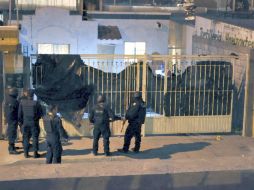 El comando armado atacó dos casas donde se reunía un grupo de jóvenes. AP  /