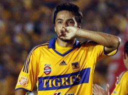 El jugador de Tigres Juninho festejando su gol en la semana 13 del torneo. AFP  /