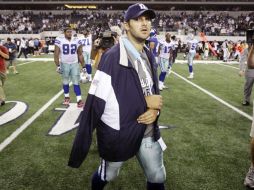 Romo estará ocho semanas fuera tras esperar recuperar su fractura en la clavícula. AP  /