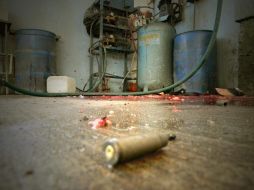 Detalle un casquillo en el lugar donde 15 personas fueron asesinadas. EFE  /