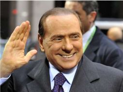 Silvio Berlusconi calificó como 'basura mediática' la amplia cobertura de la prensa. AFP  /