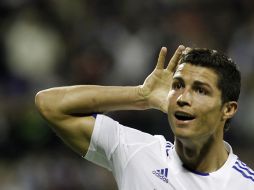 Cristiano Ronaldo sigue en su racha goleadora con el Real Madridy lo tiene en la cima del torneo. AFP  /