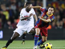 El jugador del Barcelona Xavi Hernández espera una batalla futbolística con el Real Madrid. AP  /