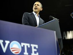 Obama dijo que con el voto solucionarán los problemas económicos en el país. AFP  /