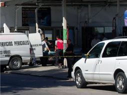 Levantamiento de 15 cadáveres en un autolavado de Tepic. La mayoría eran internos del centro de rehabilitación para drogadictos. AFP  /