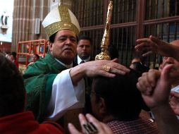 El cardenal Norberto Rivera en la misa en la Catedral Metropolitana. La Iglesia condena cualquier nexo con el narco. EL UNIVERSAL  /