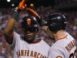 Los jugadores de los Gigantes de San Francisco, Edgar Rentería y Aaron Rowand. REUTERS  /