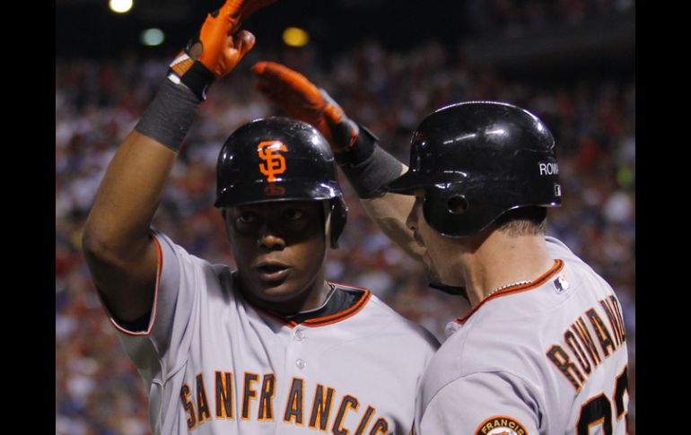 Los jugadores de los Gigantes de San Francisco, Edgar Rentería y Aaron Rowand. REUTERS  /
