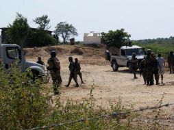 Elementos del Ejército mexicano, Marina y policías estatales buscaron el martes la fosa en el poblado de Tunzingo. EL UNIVERSAL  /