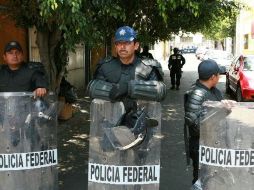 En estados como Sinaloa o Chihuahua, el alto índice de policías asesinados impide asegurarlos. ARCHIVO  /