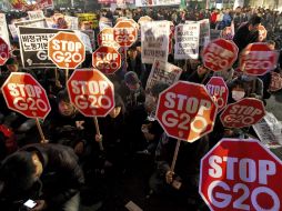 Aspecto de los manifestantes contra el G-20 y la globalización. EFE  /