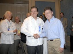 Alejandro Aguirre, prsidente de la SIP, junto a Juan Manuel Santos, presidente de Colombia. NTX  /