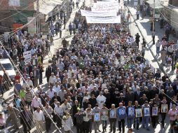 Centenares de personas participan en una manifestación para condenar los atentados contra la comunidad cristiana. EFE  /
