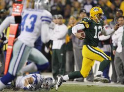 Aaron Rodgers (12) fue importante para el triunfo de Green Bay. AP  /