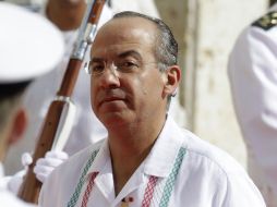 El Presidente Calderón señala que ninguna nación democrática está exenta de este delito. REUTERS  /