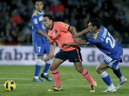 Xavi Hernández, en acciones del partido de este Domingo pasado. EFE  /