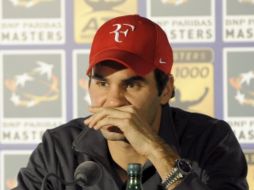El tenista suizo Roger Federer pide que la temporada de tenis 2012 sea más corta. EFE  /