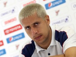 El jugador del Rebaño Sagrado Adolfo Bautista asegura que la prensa ha atacado mucho al equipo rojiblanco en el Apertura 2010. MEXSPORT  /