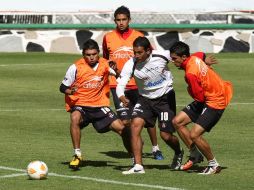 Los jugadores del Atlas se preparan para enfrentar su último partido del torneo mexicano. MEXSPORT  /