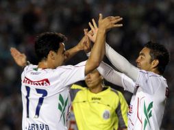 Omar Bravo y Marco Fabian de las Chivas de Guadalajara celebra el gol, durante juego de semana 17 del torneo de Apertura 2010. MEXSPORT  /