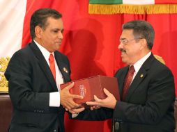 Fidel Herrera (izquierda) rindió su VI y último Informe de Gobierno. NTX  /