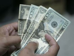 Divisa ganó 0.68% a 12.2835 - 12.2860 por dólar. ARCHIVO  /