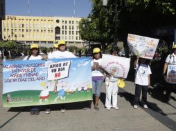 Integrantes de MAMÁ A.C., recorren las calles de la ciudad para difundir los derechos de los niños. S. NÚÑEZ  /