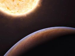 El exoplaneta es ligeramente más grande que Júpiter. AFP  /