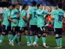 Los jugadores del Barcelona en su duelo ante el Almeria de la liga española. AFP  /